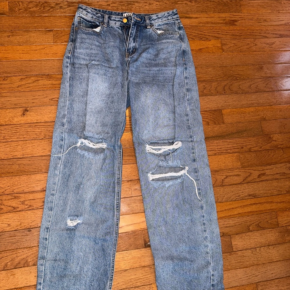 I am gia jeans, ripped at knee